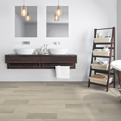 bathroom with light tan wooden flooring